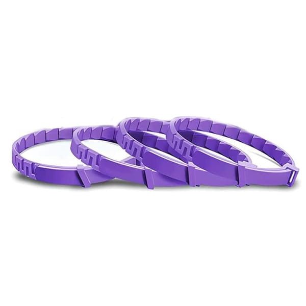 Purple plastic bands on a white background