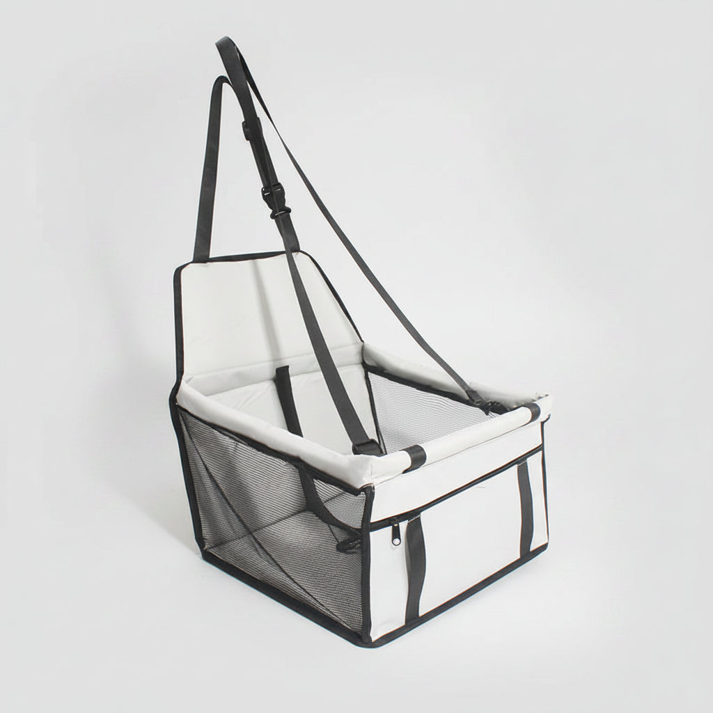Pet carrier with mesh sides and white interior on a white background