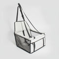 Pet carrier with mesh sides and white interior on a white background