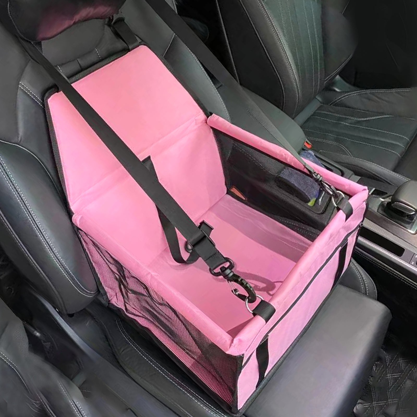 Pink pet seat cover on a car seat with straps